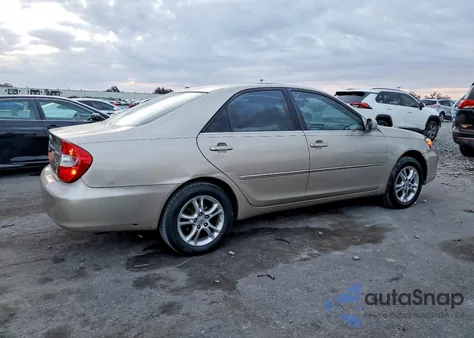 2004 Toyota Camry Le from USA, damaged, VIN 4T1BF32K94U067651